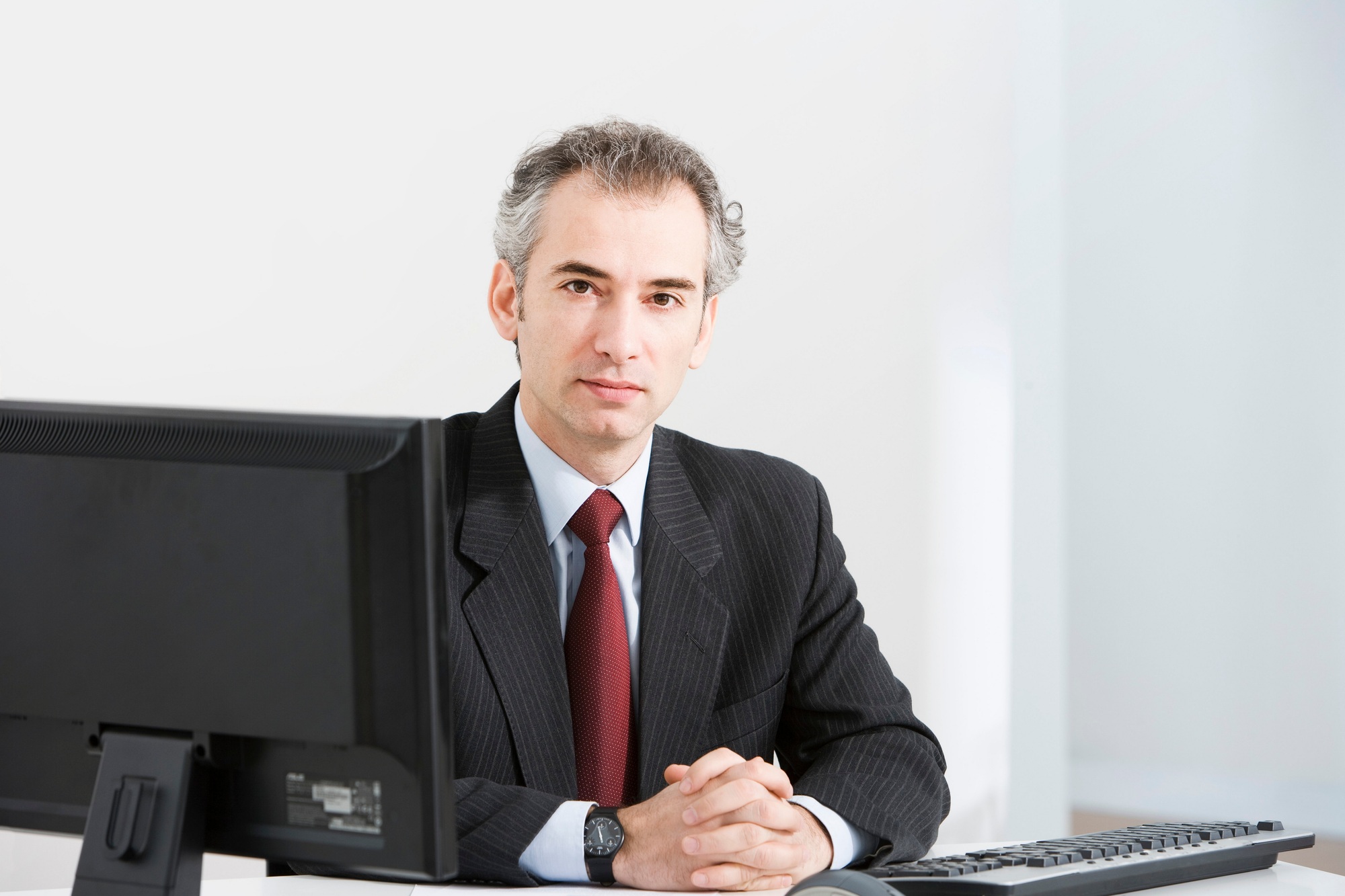 A portrait of a latin business manager